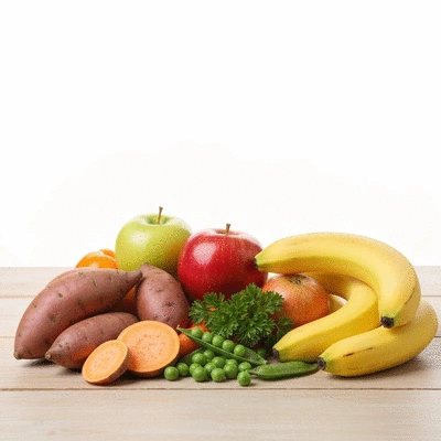 Assortment of fresh, colorful organic fruits and vegetables suitable for baby food preparation